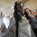 Michigan senior quarterback Denard Robinson throws his hands in the air as he rejects his teammate's offer to join them on the "Cheetah Hunt" roller coaster ride at Busch Gardens in Tampa, Fla. on Saturday, Dec. 29 during a team outing. Melanie Maxwell I AnnArbor.com